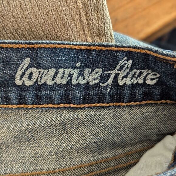 Calvin Klein Regular Wash Low Rise Flare Jeans - Picture 6 of 6